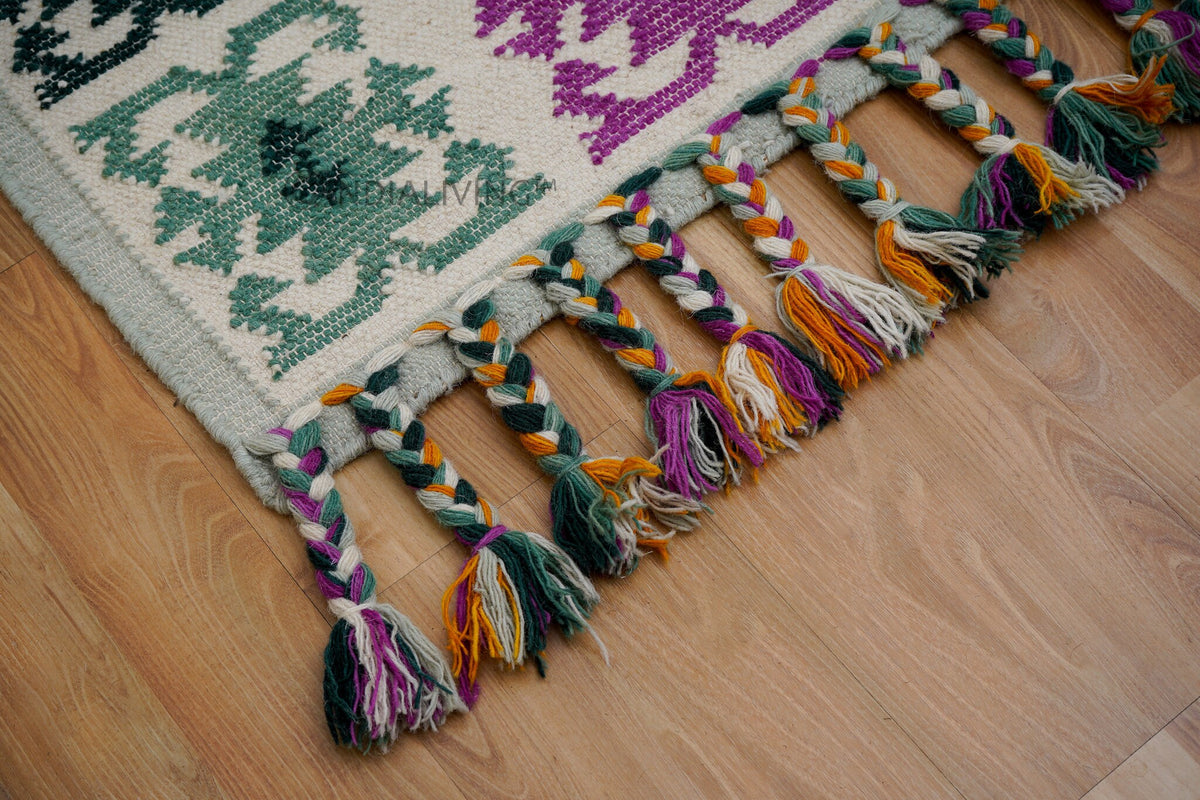 Wide shot of green Moroccan rug in a bright room