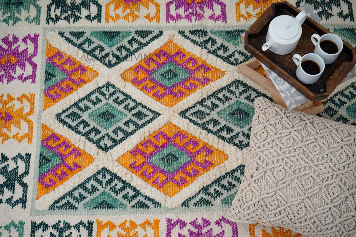 Green wool rug texture close-up showing pile