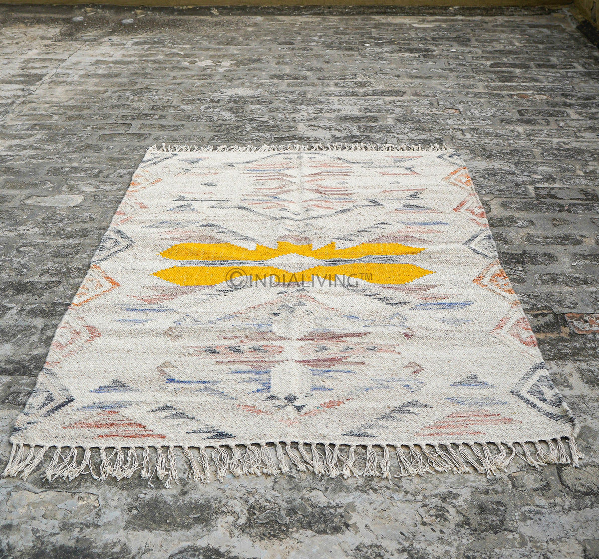 Beige rug edge and fringe close-up detail