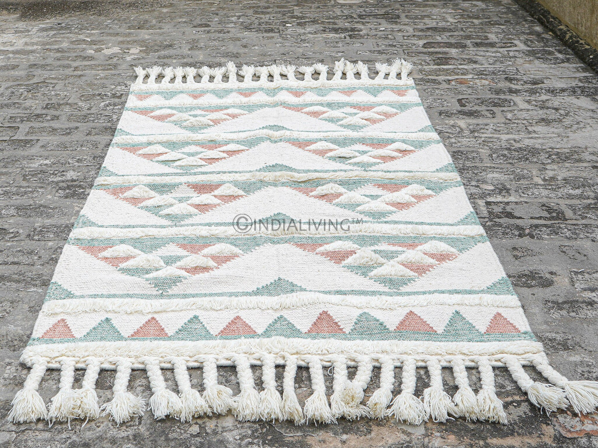 Interior design pink blue rug with geometric motifs