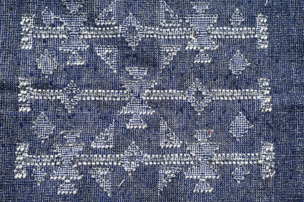 Blue Moroccan wool rug edge and knot detail