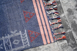 Full top-down view of oversized blue rug