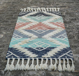 Colourful kilim shag rug laid in a living room