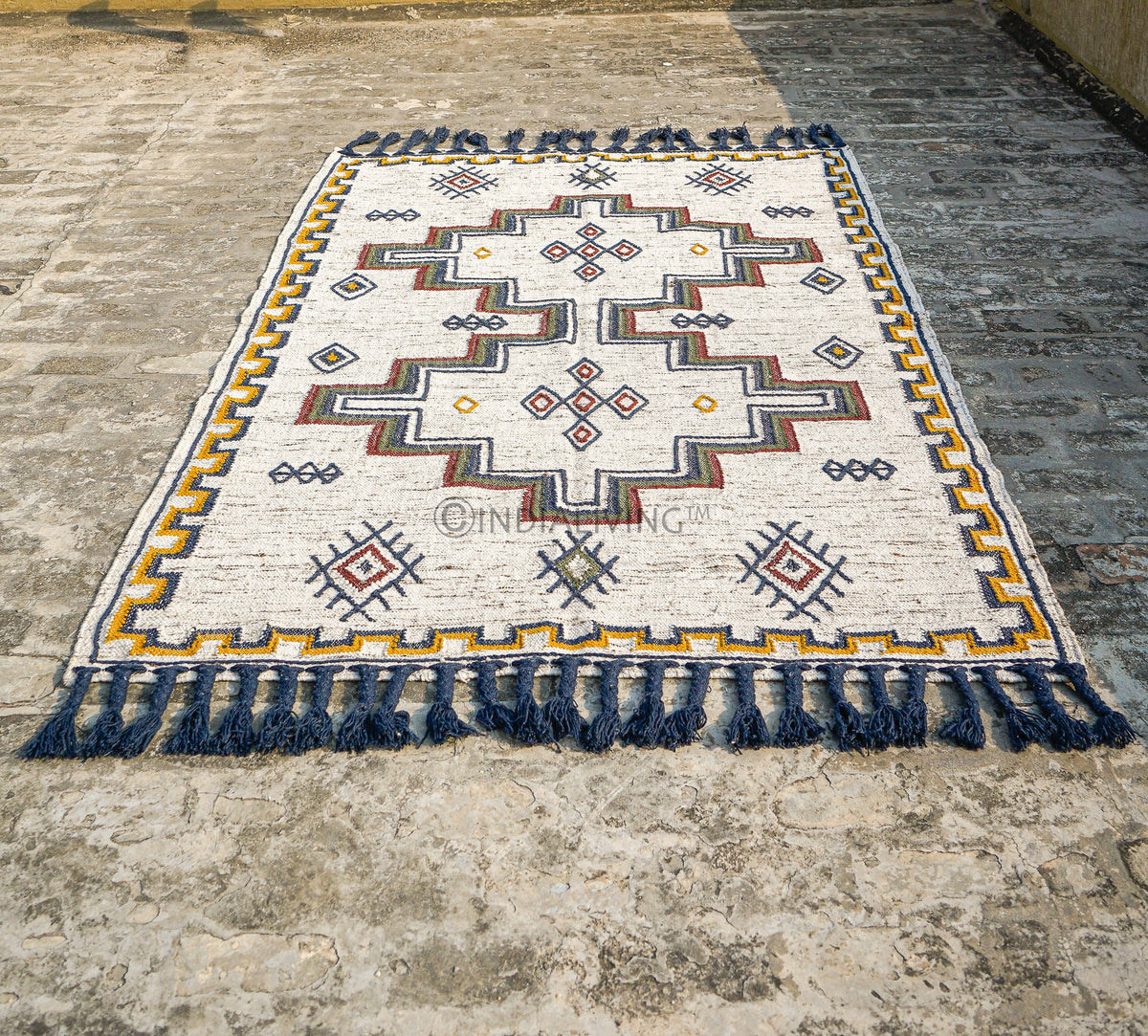 Kilim rug styled with bohemian patio decor