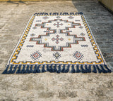 Kilim rug styled with bohemian patio decor