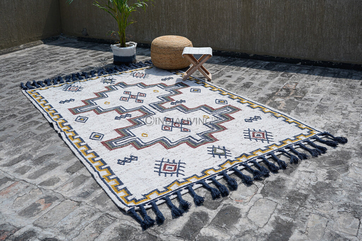 Full view of tribal kilim rug in natural light