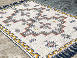 Kilim rug styled on a covered patio