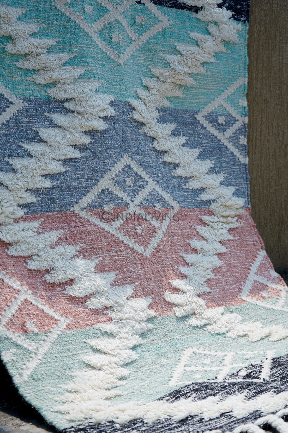 Close-up of the shag texture and knotted fringe