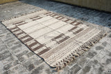 Farmhouse wool rug texture close-up