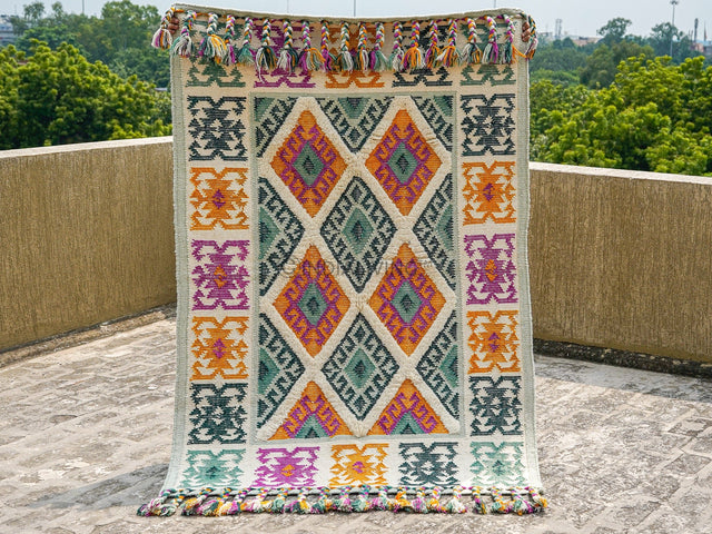 Green Moroccan tribal wool rug, flat lay view