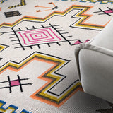 Ivory flatweave rug in an indoor outdoor setting