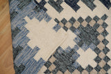 Beige blue rug edge and fringe close-up detail