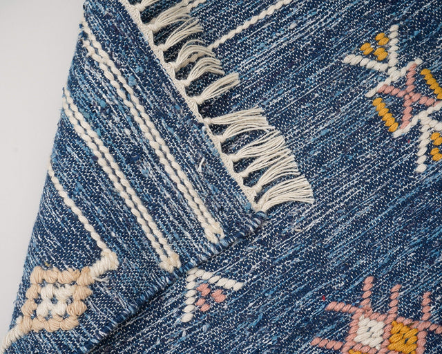 Aztec kilim rug styled in a living room