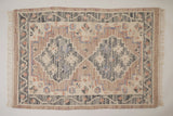 Pink kilim rug shown in 5x8 size