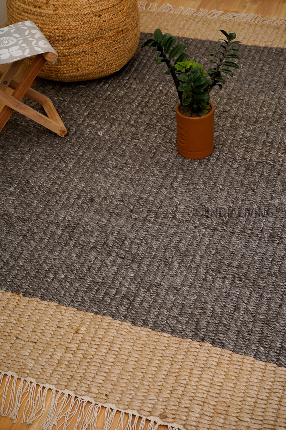 Charcoal grey and beige chunky loop rug flat lay