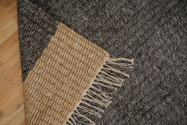 Chunky rug styled in modern living room
