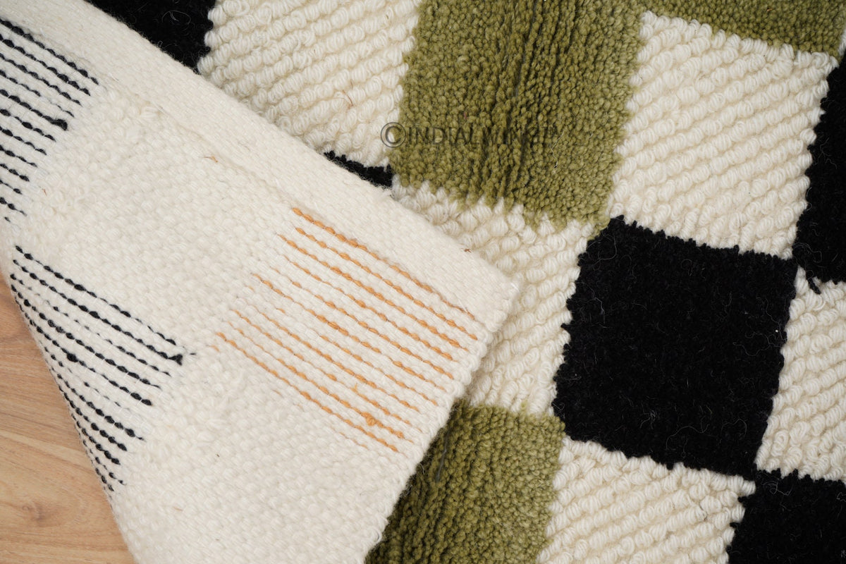 Checkered wool rug corner and edge detail