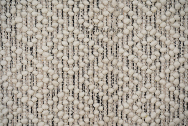 Hand knotted chunky wool rug flat lay