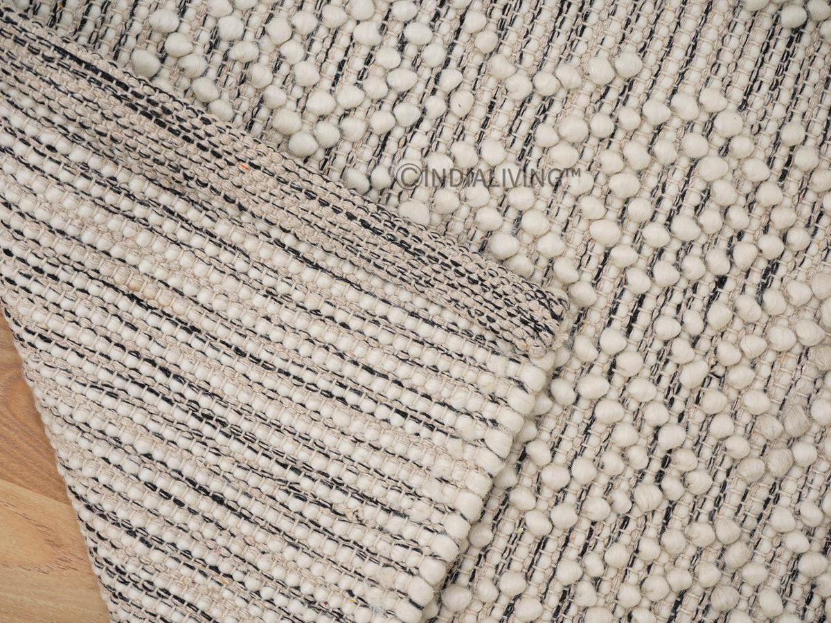 Chunky wool rug styled in a living room