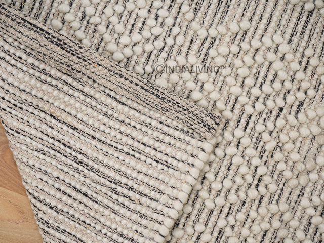 Chunky wool rug styled in a living room