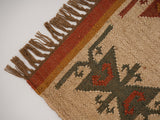 Red Navajo kilim runner corner detail and fringe