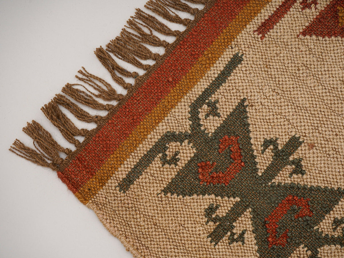 Red Navajo kilim runner corner detail and fringe
