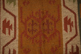 Red Navajo kilim runner folded for shipping