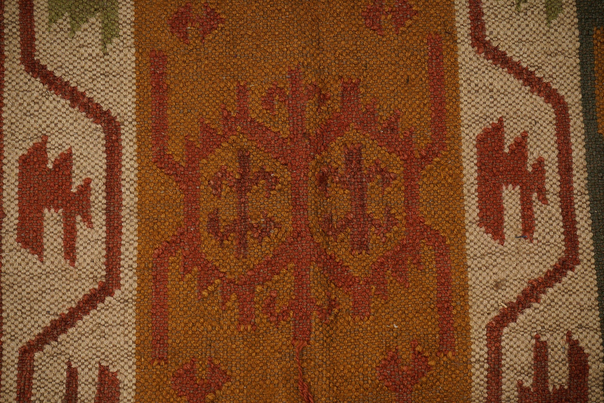 Red Navajo kilim runner folded for shipping