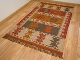 Red Navajo kilim runner in an entryway setting