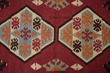 Red kilim rug corner detail