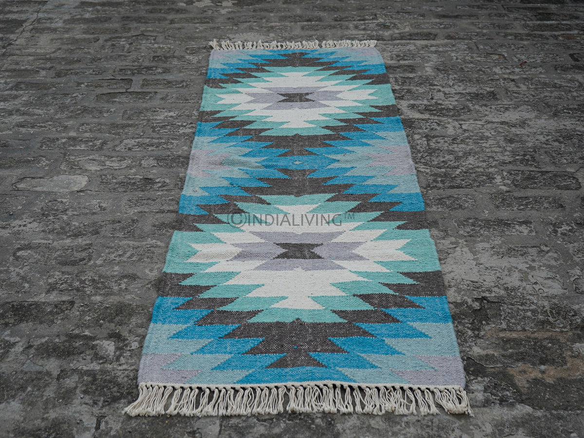 Blue geometric runner styled in a hallway