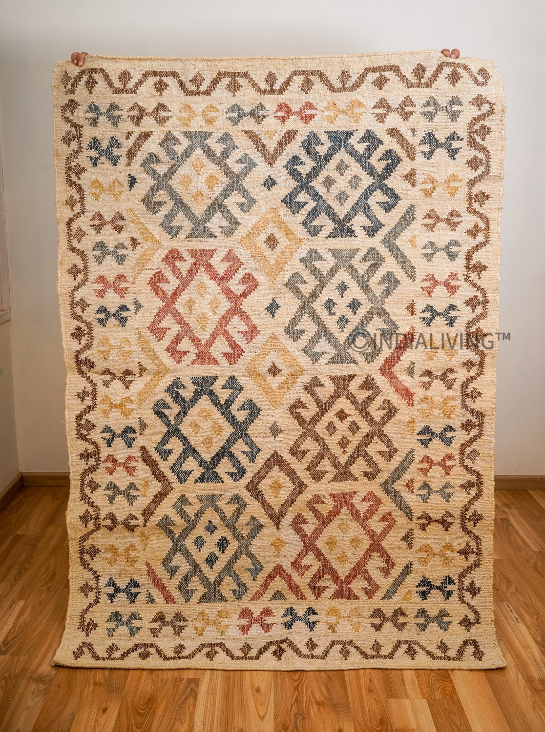 Colourful jute rug placed under furniture in room