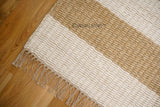 Ivory beige striped wool rug texture macro shot
