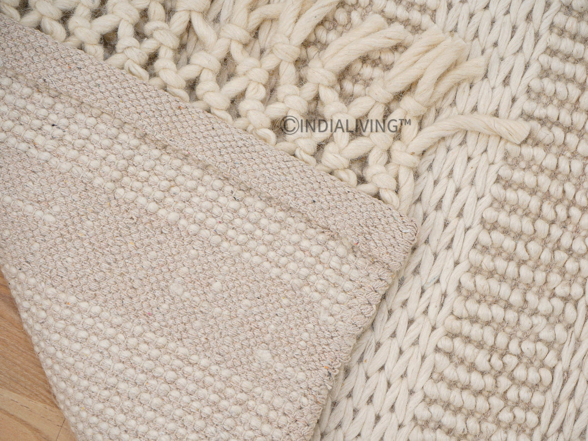 Close-up of ivory braided wool texture