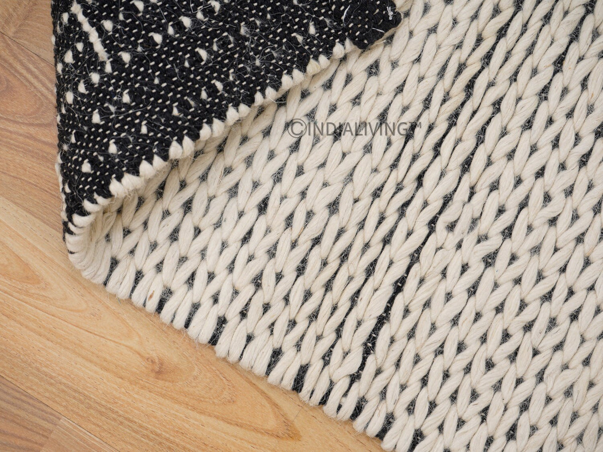 Close-up of hand knotted braided wool loop texture