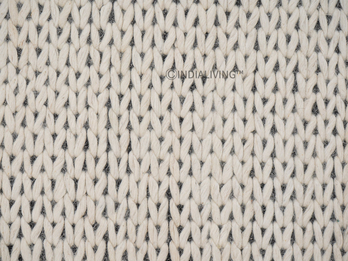 Ivory chunky wool rug styled in a living room setting