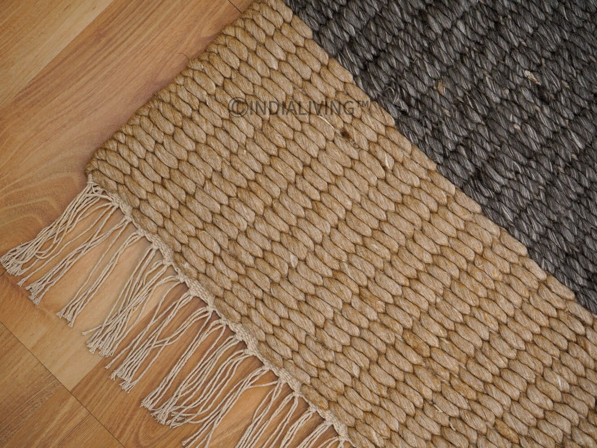 Rug corner detail showing charcoal grey tone