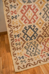 Full flat lay of colourful Aztec jute rug