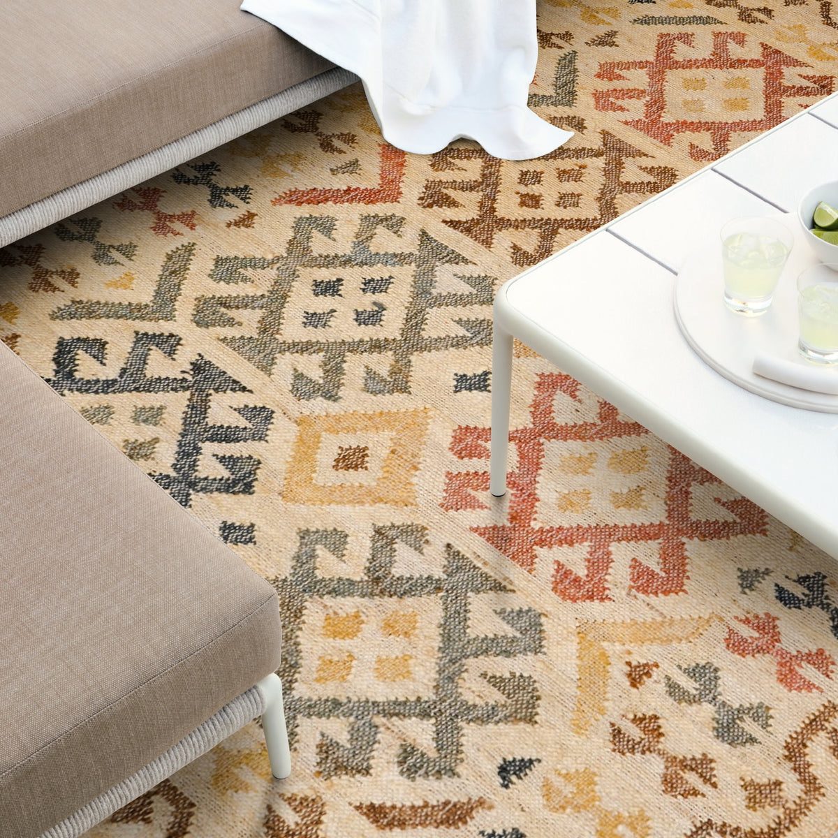 Aztec pattern jute rug in bedroom setting