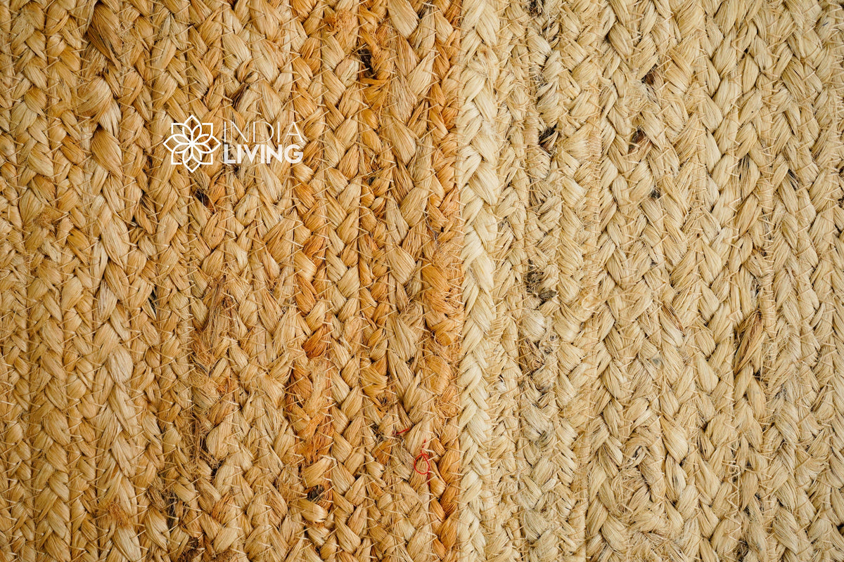 Full view of natural jute rug on wood floor