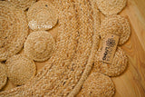Round jute rug in a bedroom setting