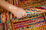 Striped rag rug styled in a living room setting