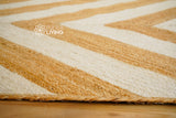 White jute braided rug in bedroom setting
