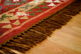 Red traditional kilim rug outdoor patio setting