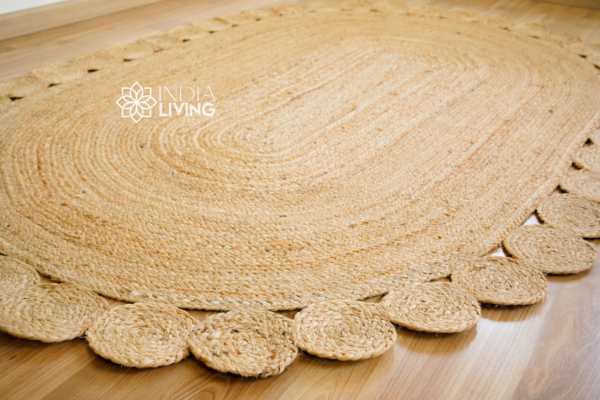 Jute oval rug styled in an entryway setting