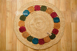 Full top-down view of round jute medallion rug