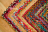 Rainbow rag rug styled in an entryway setting