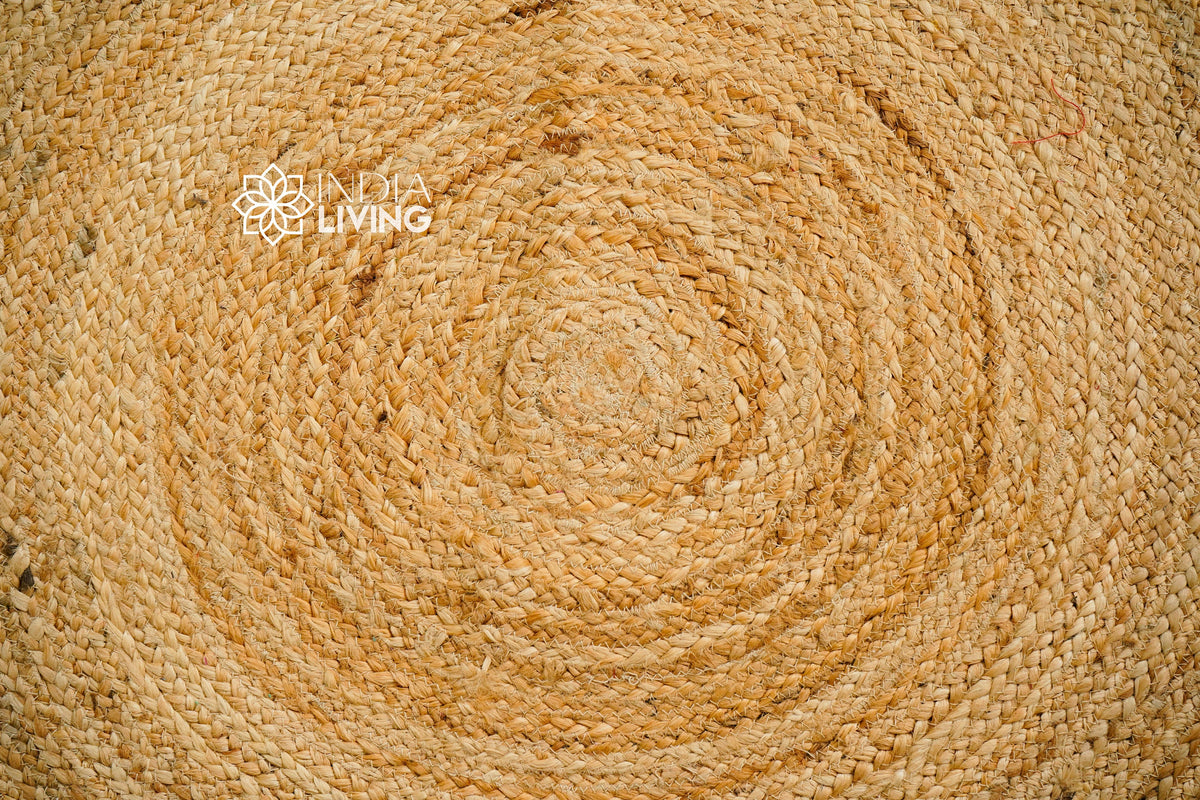 Round jute mat in living room setting