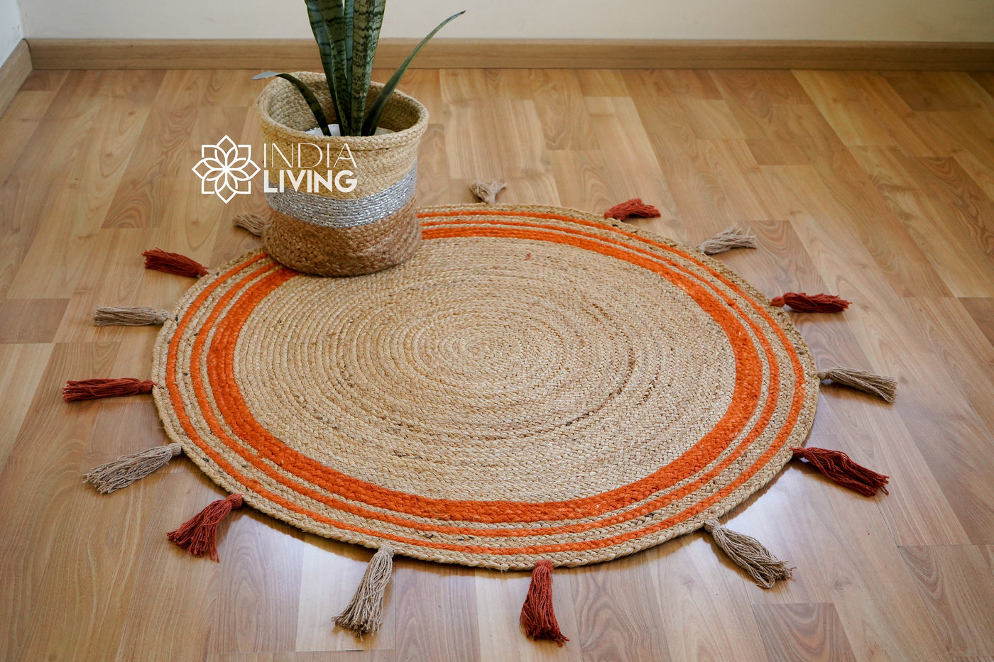 Orange braided jute mat with tassels, full flat view