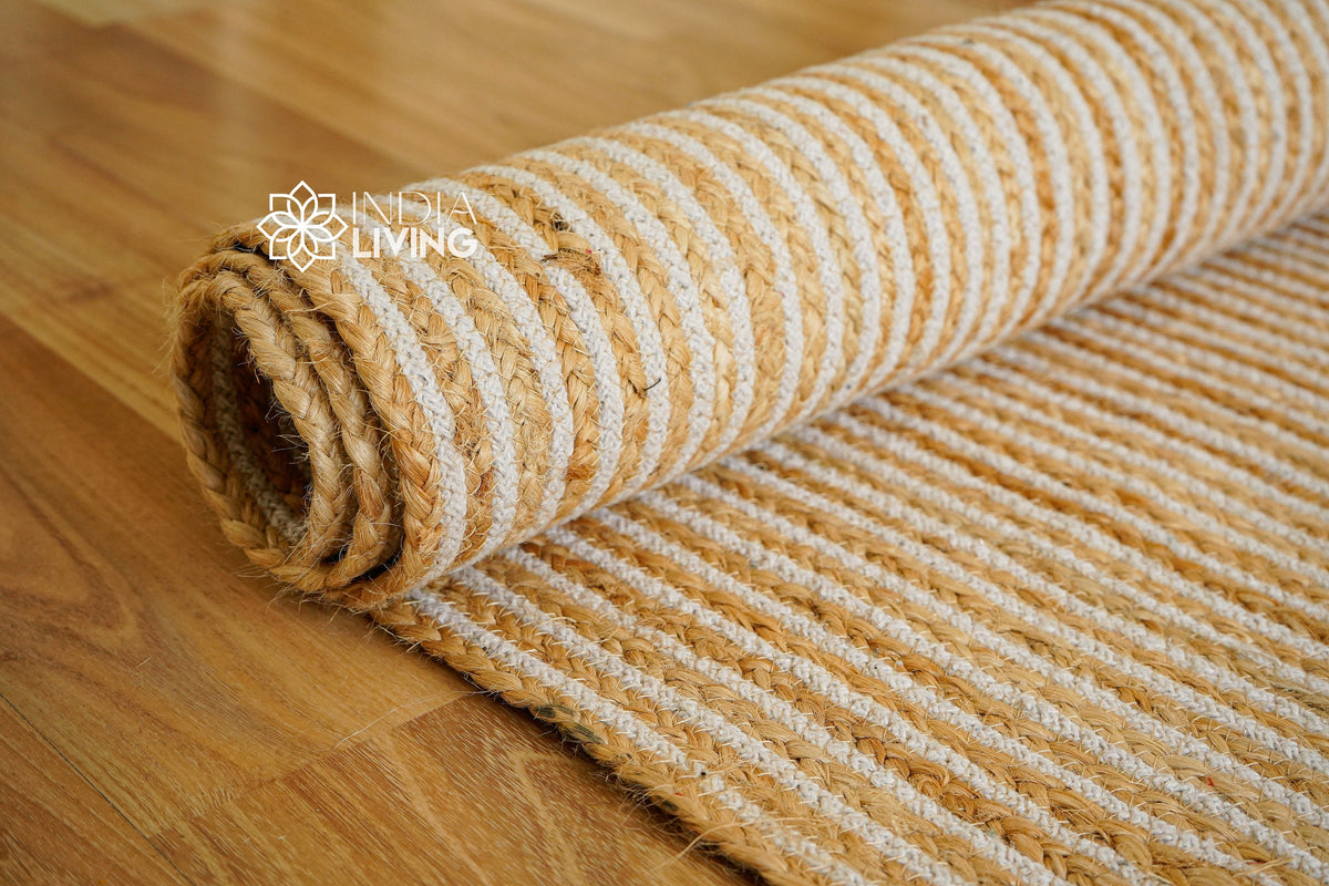 White jute rug styled in a living room